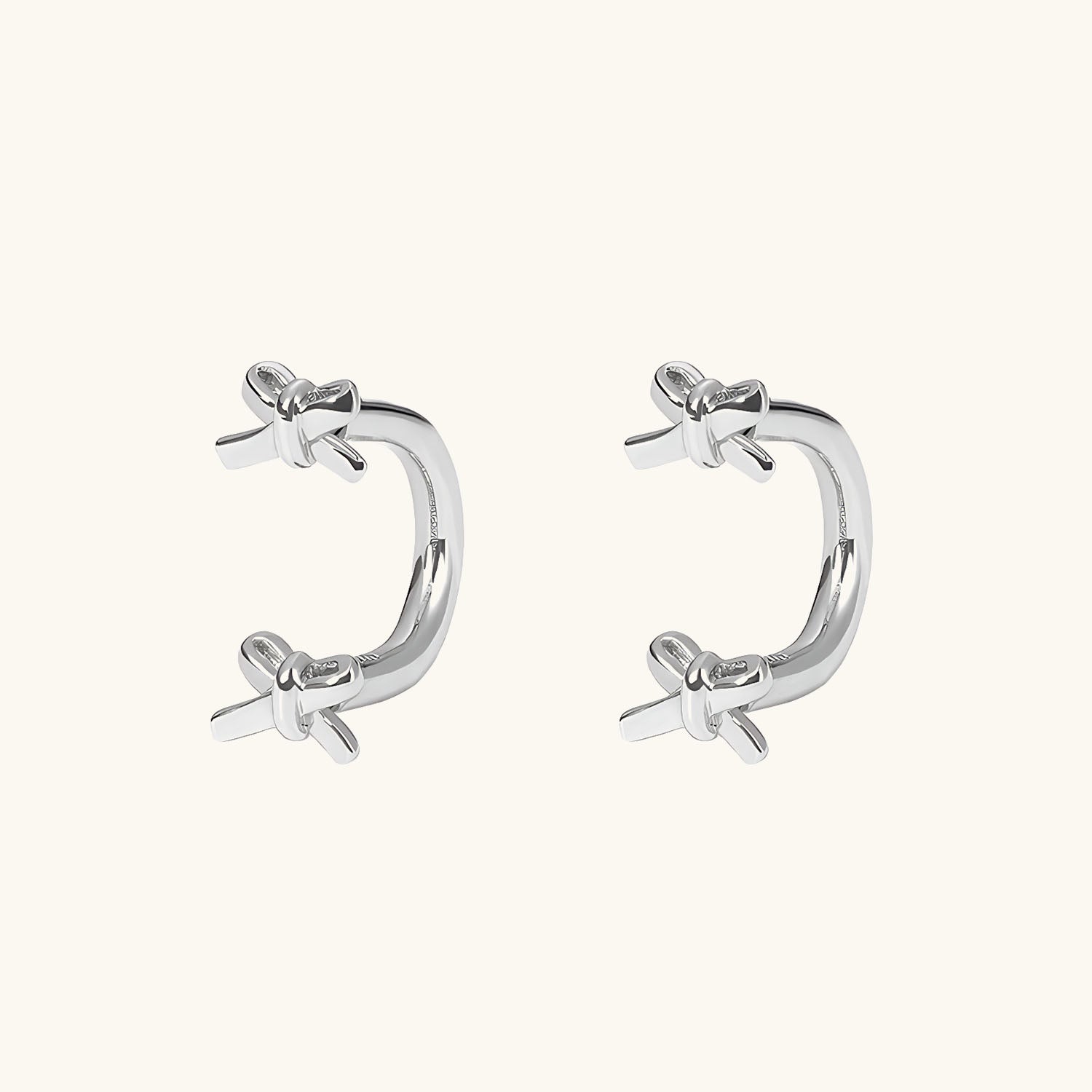Cute Bowknot U Hoop Huggie Earrings - Silver