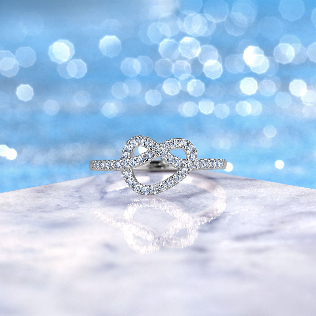Intertwined Moissanite Love Knot Ring - Silver
